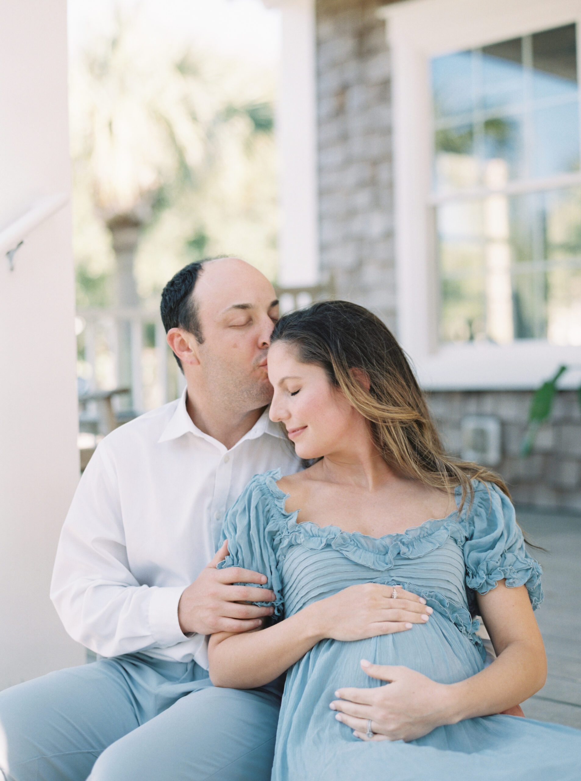 Pregnant couple on date night in Birmingham exploring romantic activities before baby