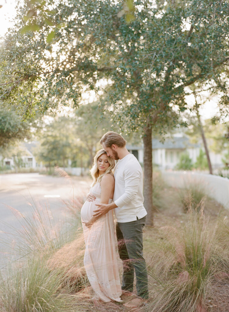 Expecting couple embracing during a maternity session in Birmingham