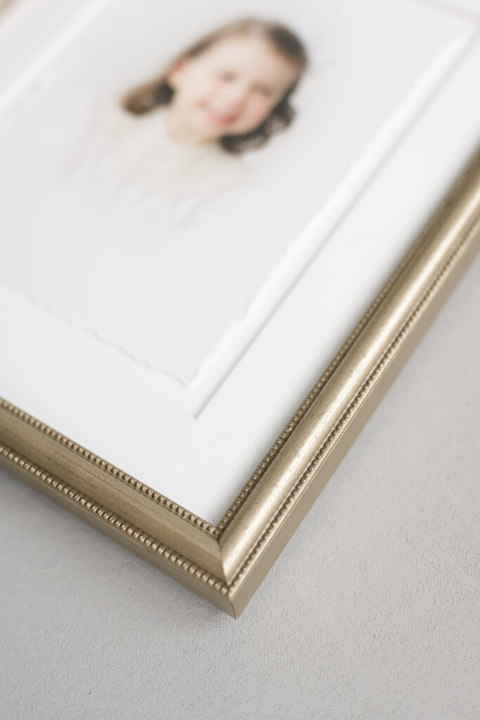 Framed fine-art heirloom portrait displayed in a Birmingham home