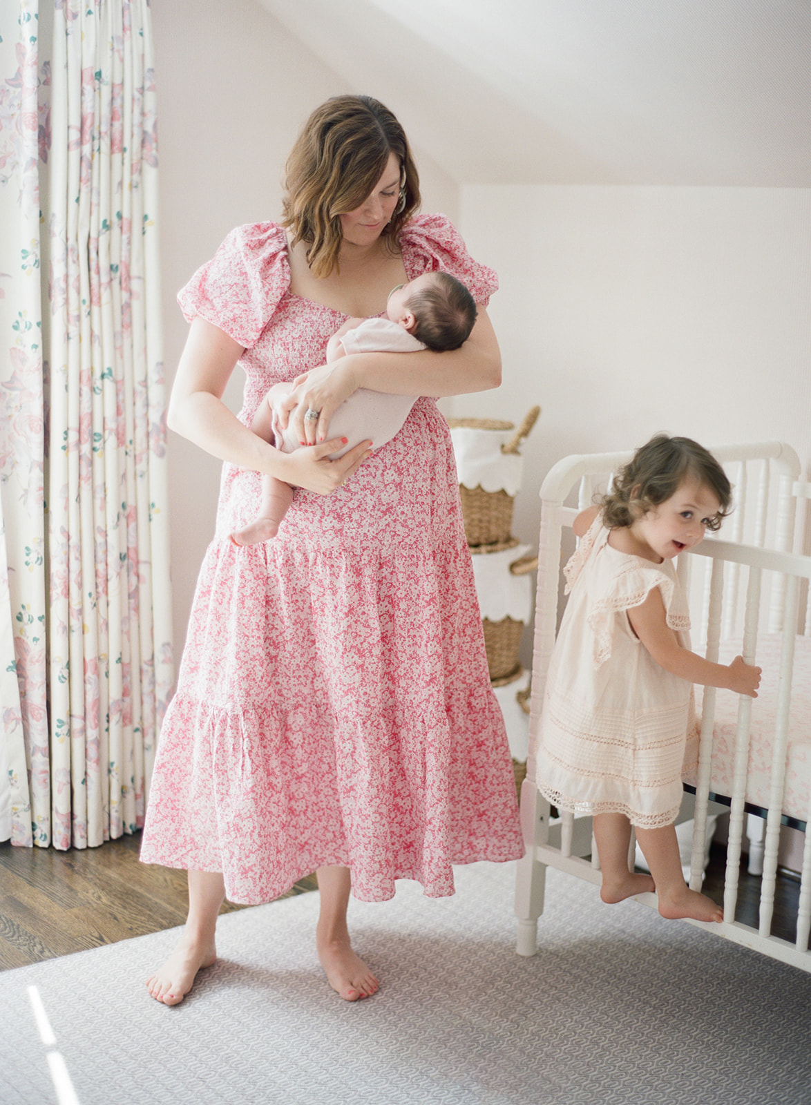 A cozy in-home newborn session capturing nursery snuggles and meaningful moments for Birmingham families.