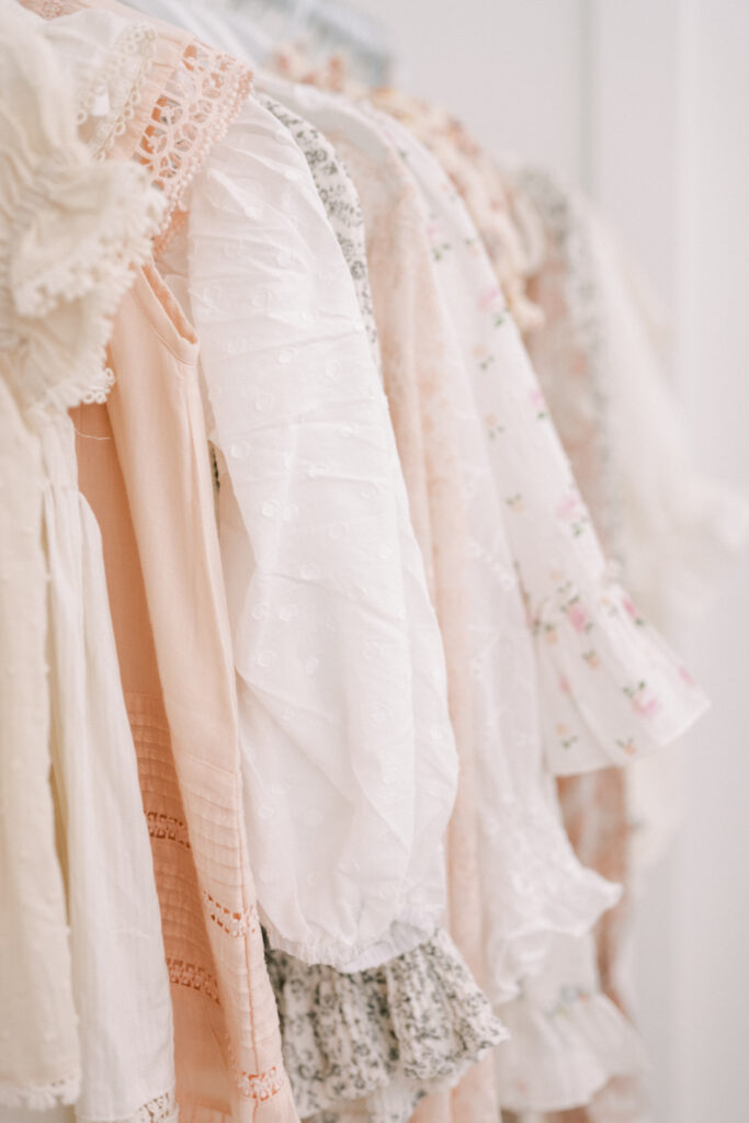 Curated client wardrobe available for mothers during a luxury newborn photography session in Birmingham.