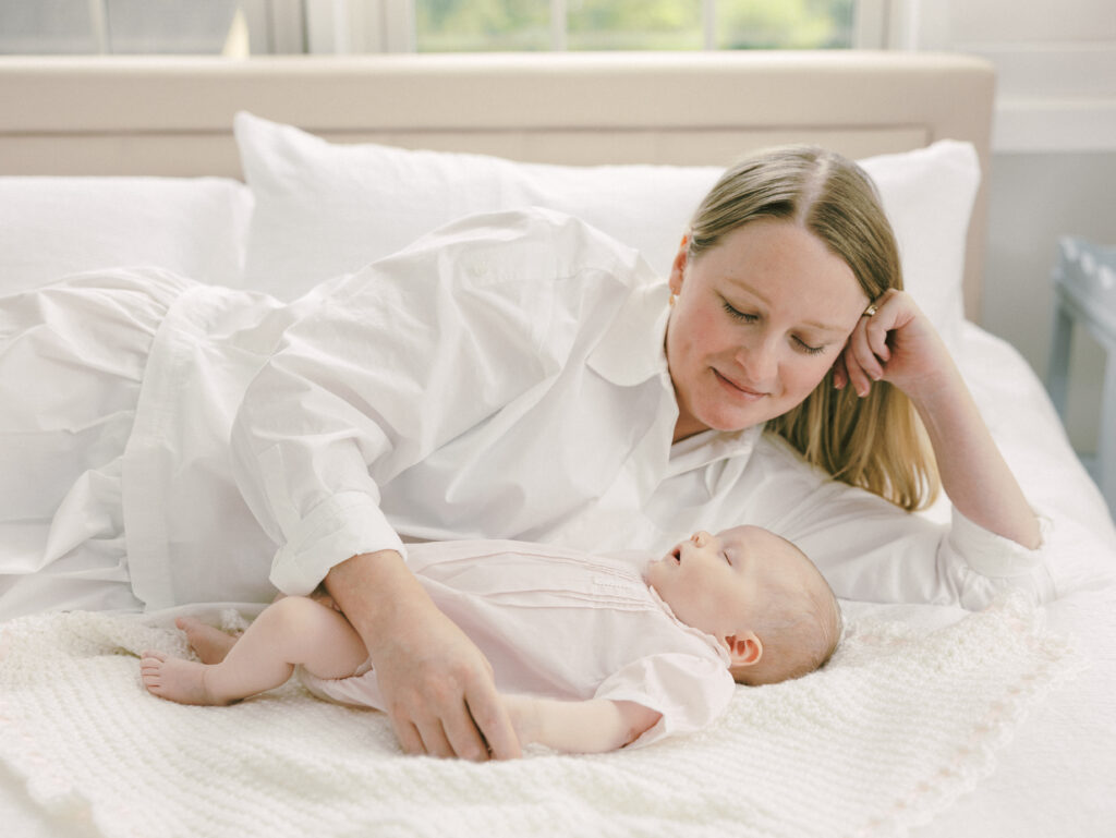 Natural in-home newborn photography session capturing everyday moments with a new baby in Birmingham.