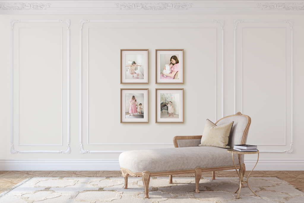 Custom wall gallery featuring framed family photographs designed for a Birmingham AL home